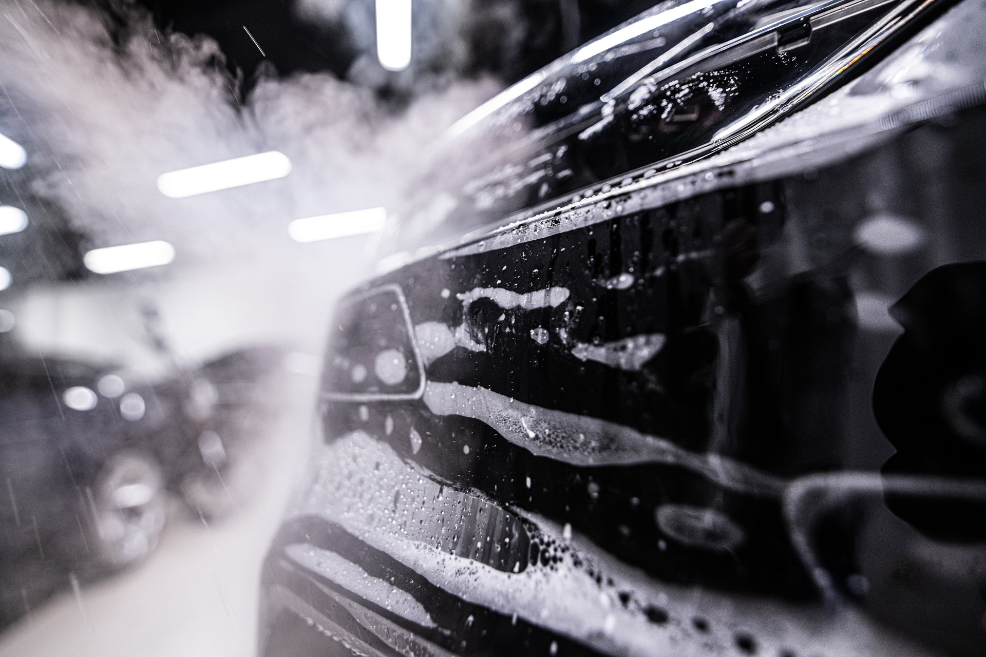 Car during the application of a colorless protective film